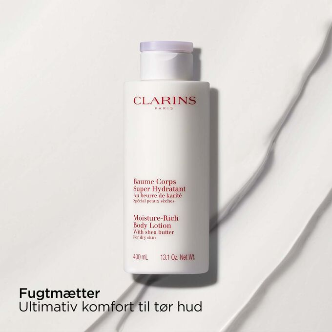 Packshot of Clarins Moisture-Rich Body Lotion with text emphasising the nourishing fect of the product on dry skin.
