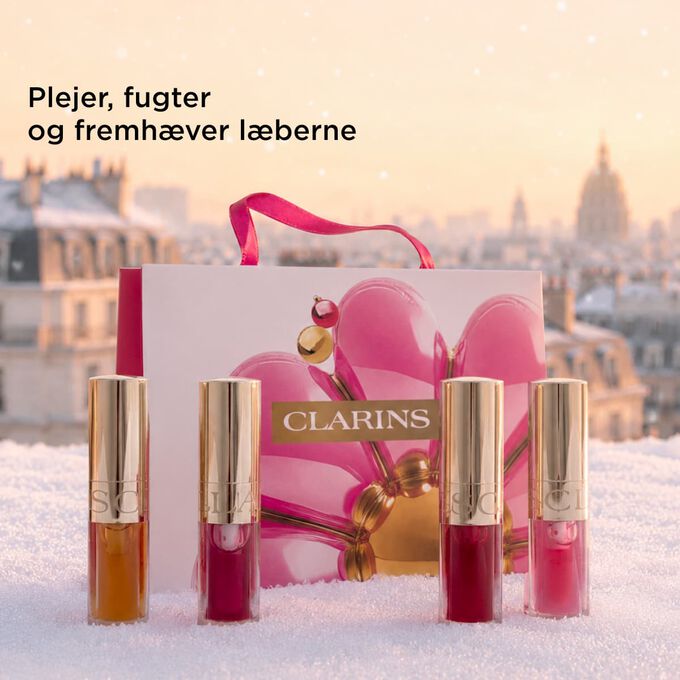 Produktbillede af Clarins jules&aelig;t med lip oils, der plejer, fugter og fremh&aelig;ver l&aelig;berne med naturlig glans