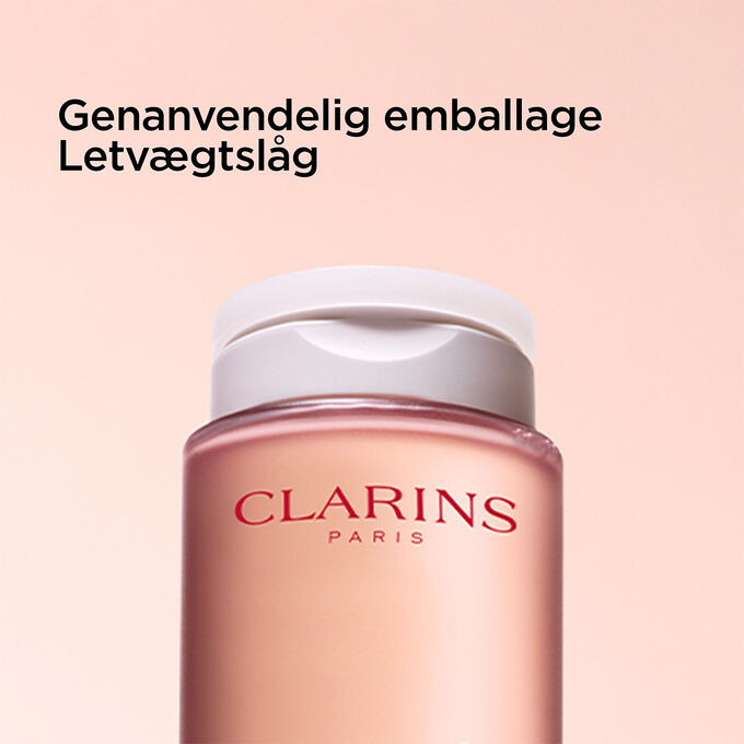 Fokus p&aring; toppen af flasken med micellarvand for at illustrere den genanvendelige emballage og det lette l&aring;g.