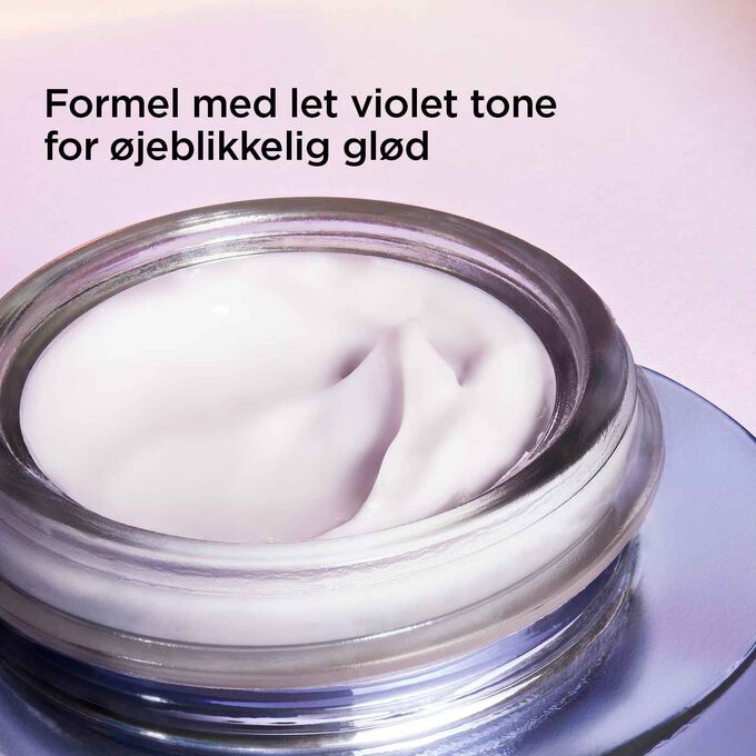 Nutri-Lumière Revive olie med let violet tone for øjeblikkelig glød