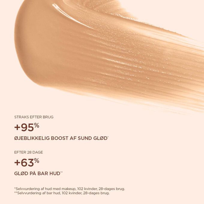 Close-up of Clarins Skin Illusion Tinted Moisturiser in shade 04 application, highlighting its natural radiance effect on bare skin.