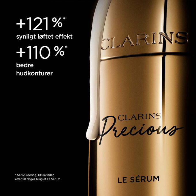 Packshot of Clarins Precious Serum on dark background, with text emphasising its power to lift and improve skin contour.