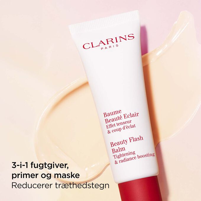 Packshot of Clarins Beauty Flash Balm on a textured background, highlighting its nourishing power for tired skin.