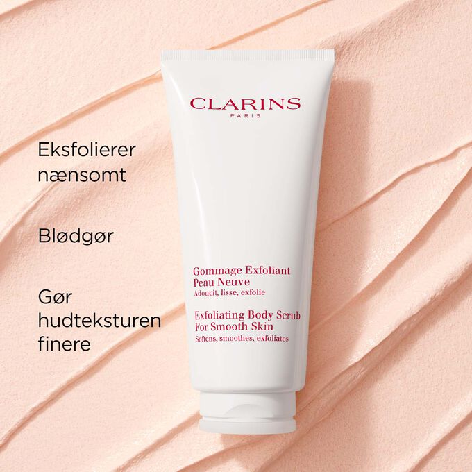 Packshot of Clarins Exfoliating Body Scrub on a textured background, illustrating its gentle exfoliating and softening effects.