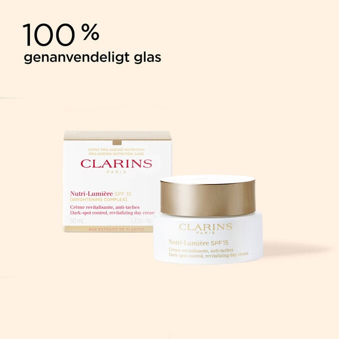 Cremeglas til anti-age-cremen Nutri-Lumi&egrave;re SPF 15 og dens emballage, der illustrerer dens genanvendelige oprindelse.