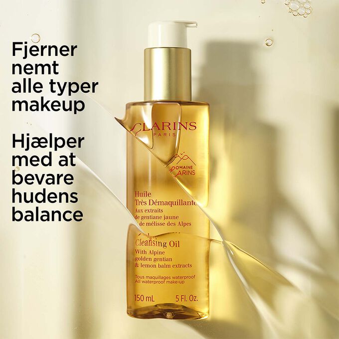 Packshot af Total Cleansing Oil, der fremh&aelig;ver dens effektivitet til at fjerne makeup samtidig med at hudens balance bevares.