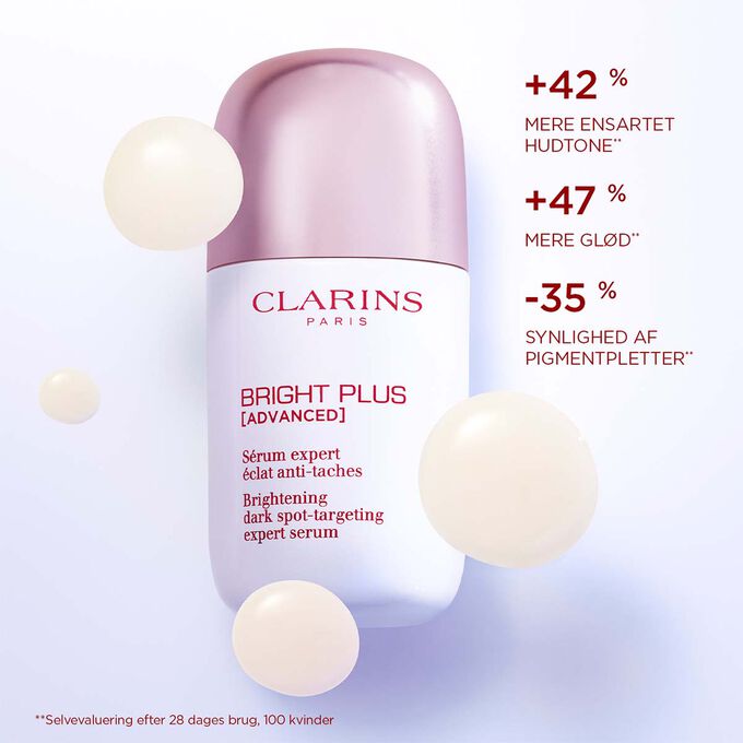 N&aelig;rbillede af Bright Plus Expert Serum med tekst, der fremh&aelig;ver dets effekt: &oslash;get gl&oslash;d og reducerede pigmentpletter.