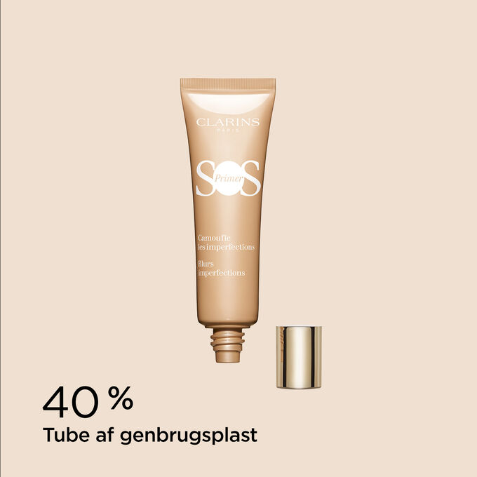Packshot of SOS Primer Peach by Clarins with text emphasising its packaging is made of 40% recycled plastic.