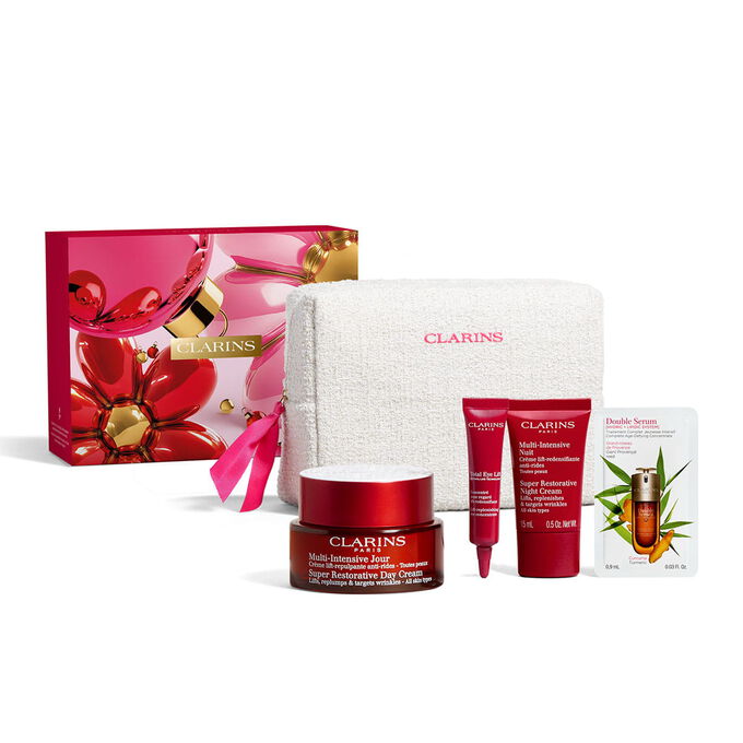 Produktbillede af Clarins kropspleje jules&aelig;t med must-haves, der eksfolierer, fugter og n&aelig;rer huden i dybden