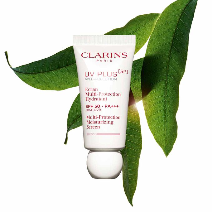 Packshot of a tube of Clarins UV Plus Anti-Pollution Rose, a Moisturising Fluid with SPF 50 on a pink background.